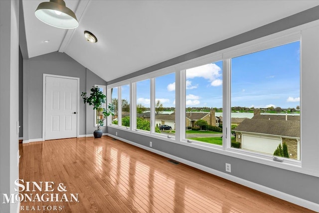 unfurnished sunroom with visible vents
