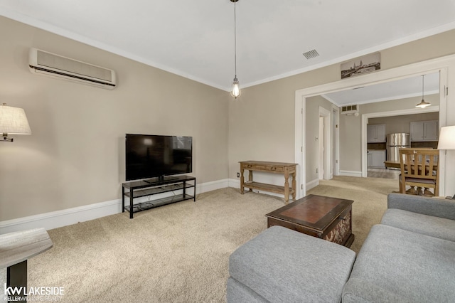 living room with a wall mounted air conditioner, baseboards, ornamental molding, visible vents, and light carpet