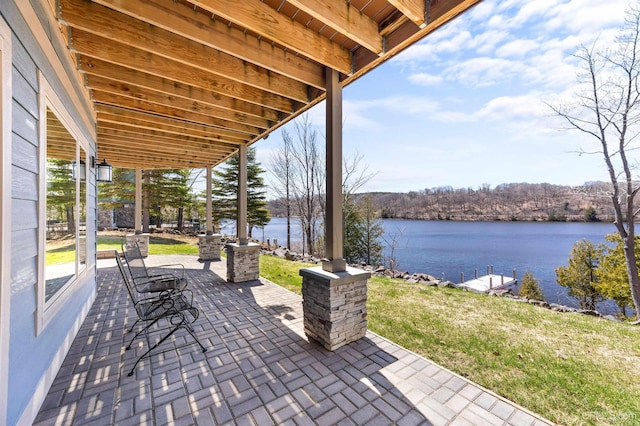 view of patio / terrace with a water view