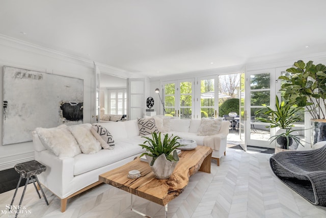 living room with ornamental molding