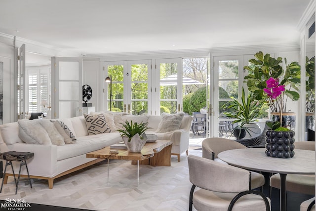 sunroom featuring french doors