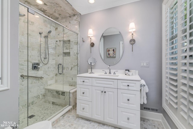full bath featuring a stall shower, vanity, visible vents, and recessed lighting
