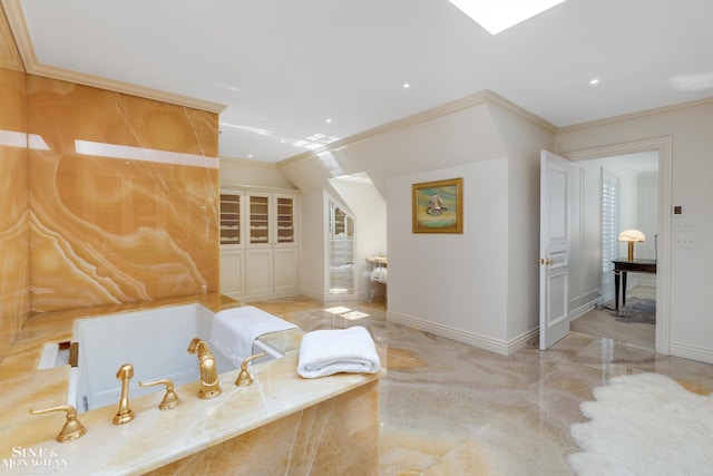 bathroom featuring crown molding, baseboards, a tub to relax in, and recessed lighting