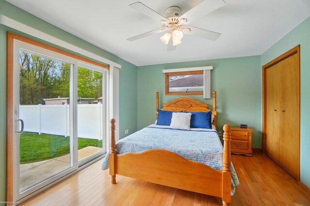 bedroom featuring ceiling fan and hardwood / wood-style flooring