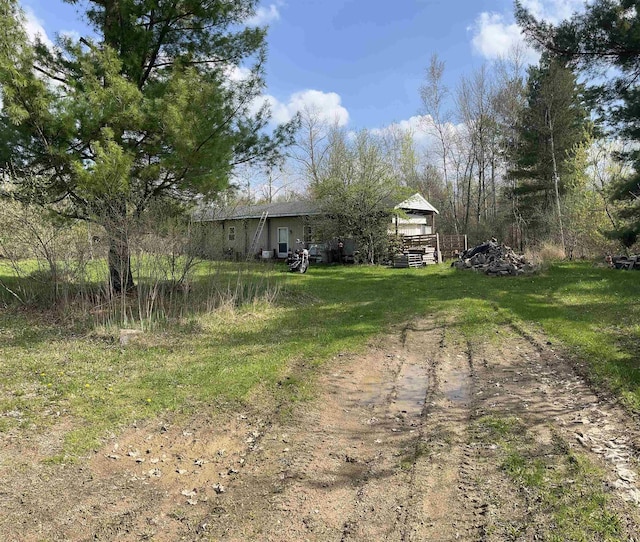 view of yard with a deck