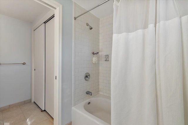 full bathroom featuring tile patterned floors and shower / bath combo