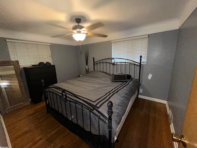 38331 Jonathan St, Clinton Township, MI 48036 - bedroom featuring baseboards, ceiling fan, and wood finished floors