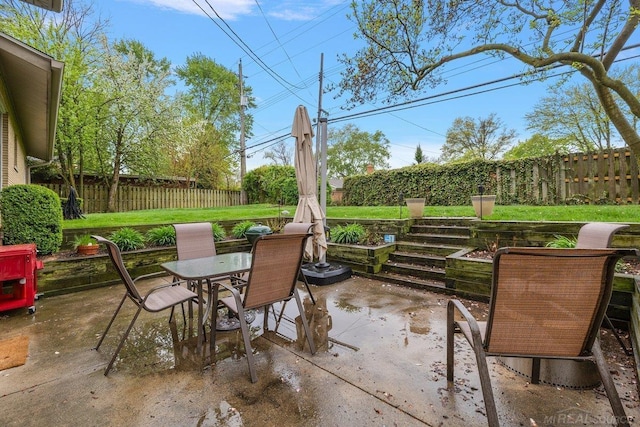 view of patio with outdoor dining area