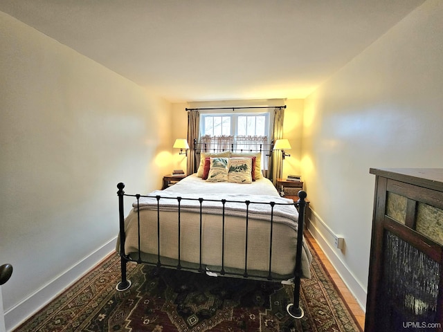 N15505 Black River Rd, Ironwood, MI 49938 - bedroom with baseboards and wood finished floors
