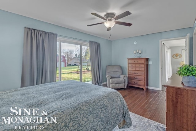 bedroom with dark wood-style floors, baseboards, and ceiling fan