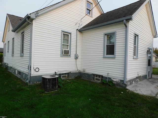 25697 Send St, Roseville, MI 48066 - back of property featuring central AC, a lawn, roof with shingles, and cooling unit
