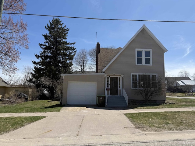 traditional home with an attached garage, driveway, a chimney, and a front yard