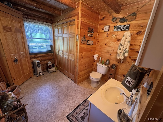 180 Wpa Rd, Crystal Falls, MI 49920 - bathroom with wooden ceiling, beamed ceiling, toilet, vanity, and wooden walls
