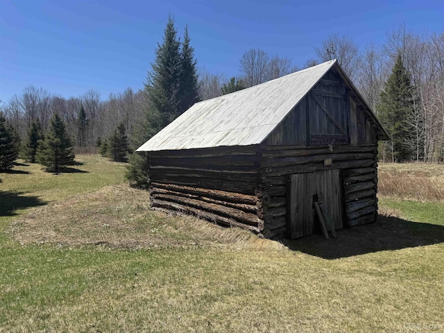 180 Wpa Rd, Crystal Falls, MI 49920 - view of barn featuring a yard and a forest view