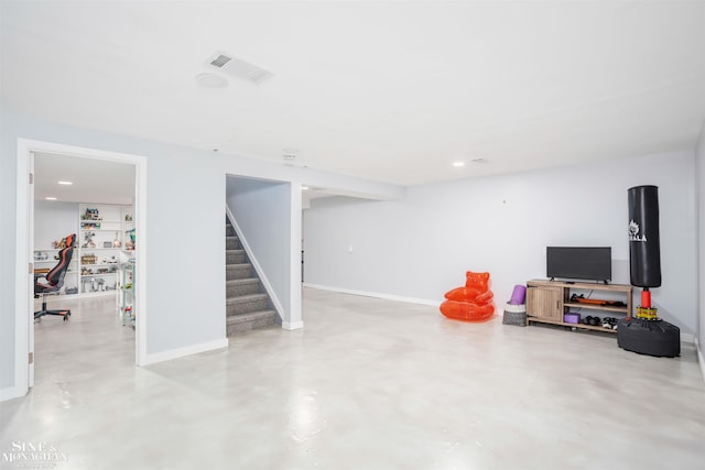 finished below grade area with stairs and baseboards