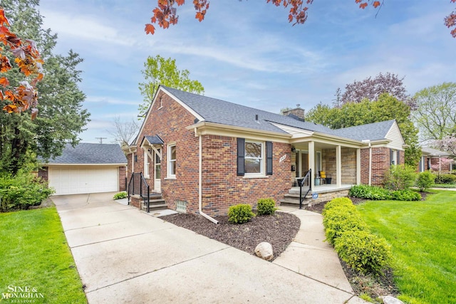 view of front of property featuring covered porch, brick siding, a front lawn, and a chimney