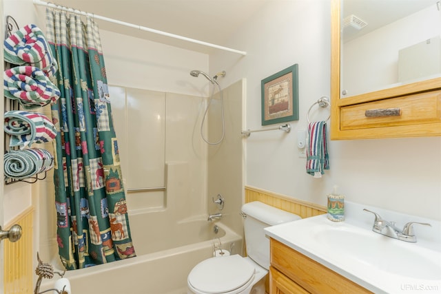 112 Little Deer Rd, Iron River, MI 49935 - bathroom featuring shower / bath combo, toilet, and vanity