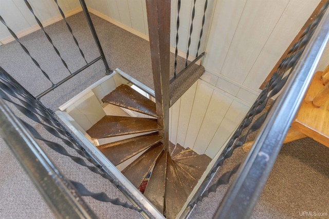 112 Little Deer Rd, Iron River, MI 49935 - stairs featuring a decorative wall and carpet