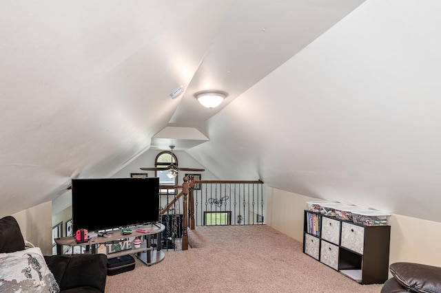 playroom with carpet, a ceiling fan, and lofted ceiling