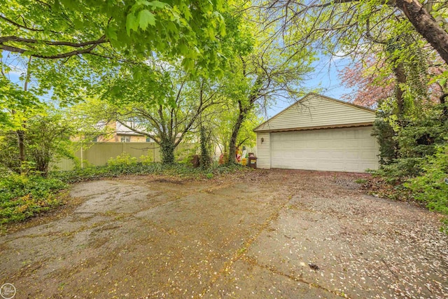 detached garage with fence