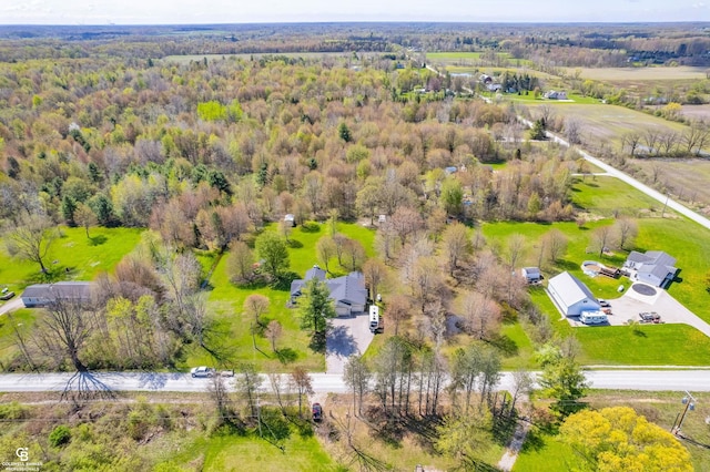 drone / aerial view of a heavily wooded area