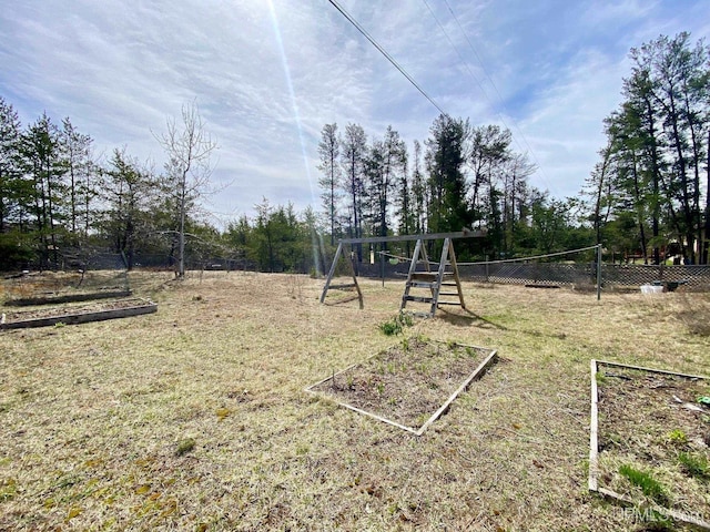 view of yard featuring a playground