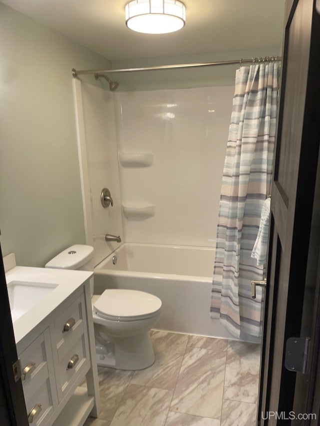 122 Rock St, Negaunee, MI 49866 - full bathroom featuring marble finish floors, shower / tub combo with curtain, toilet, and vanity