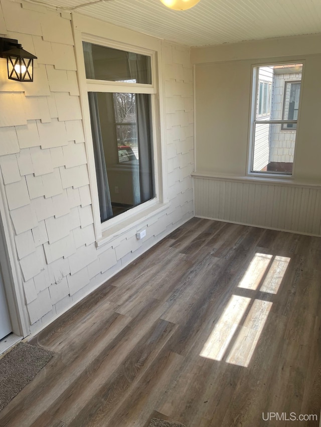 122 Rock St, Negaunee, MI 49866 - spare room with wood finished floors