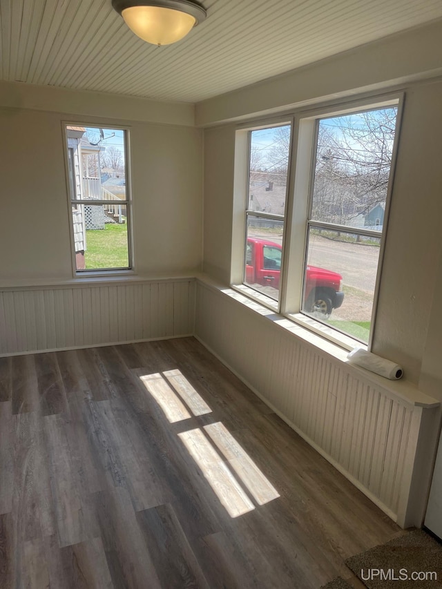 122 Rock St, Negaunee, MI 49866 - unfurnished room featuring wood finished floors and wainscoting