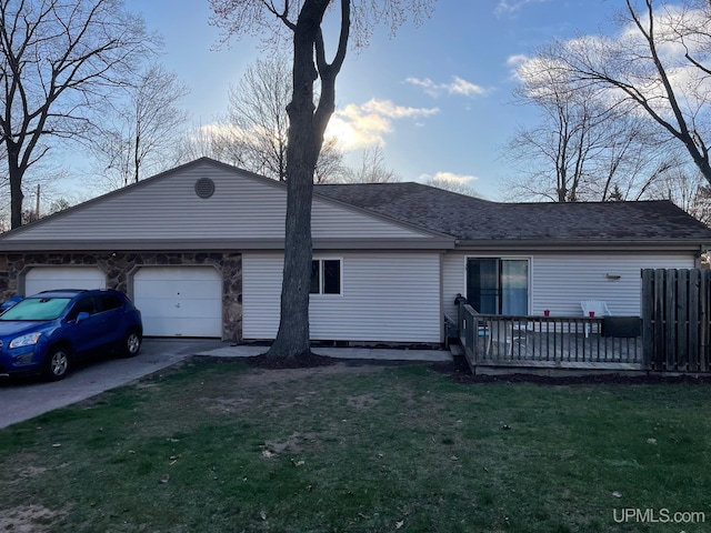 view of front of property with an attached garage and concrete driveway