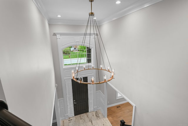 835 Crestwood Ln, Rochester Hills, MI 48309 - entrance foyer with ornamental molding, a chandelier, recessed lighting, and wood finished floors