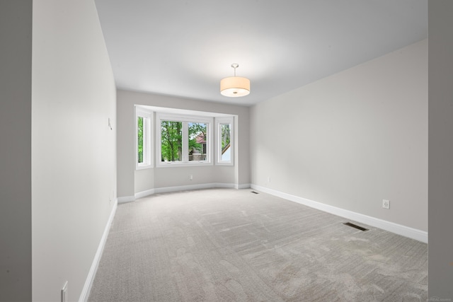 835 Crestwood Ln, Rochester Hills, MI 48309 - unfurnished room featuring carpet flooring and baseboards