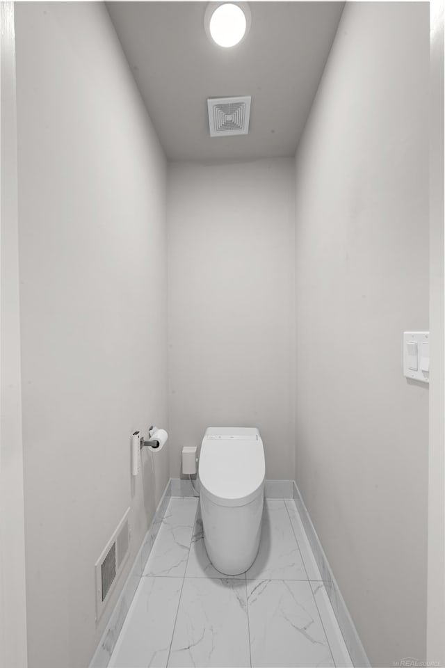 835 Crestwood Ln, Rochester Hills, MI 48309 - bathroom with toilet, marble finish flooring, and baseboards