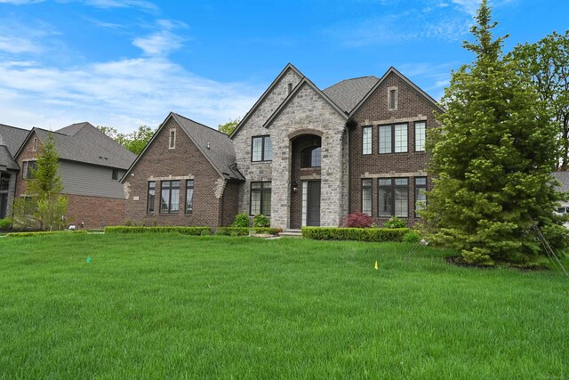 835 Crestwood Ln, Rochester Hills, MI 48309 - french provincial home featuring brick siding and a front yard