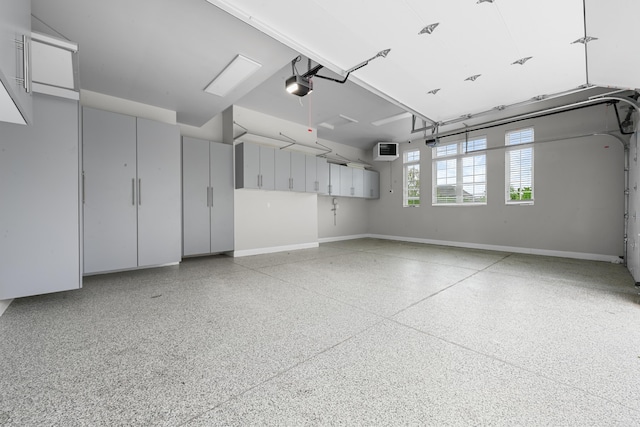 835 Crestwood Ln, Rochester Hills, MI 48309 - garage with a garage door opener and baseboards