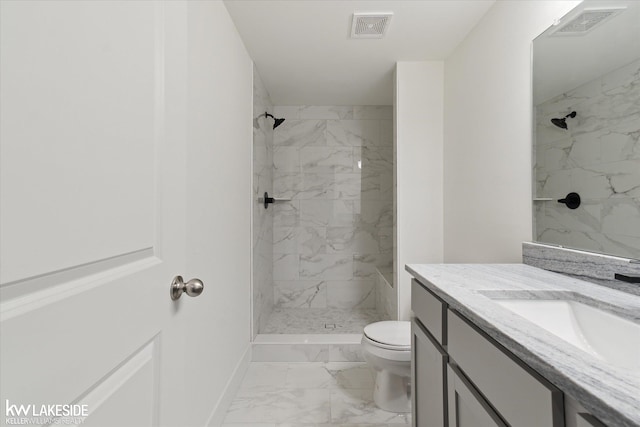 21168 Lilac Ln, Clinton Township, MI 48036 - full bath featuring marble finish floors, toilet, a marble finish shower, and vanity