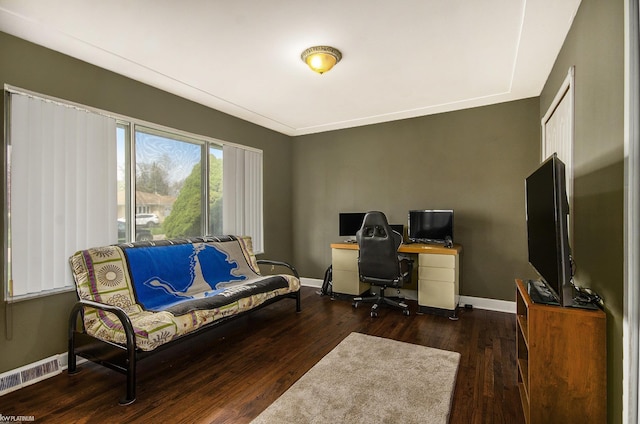 home office featuring wood finished floors and baseboards
