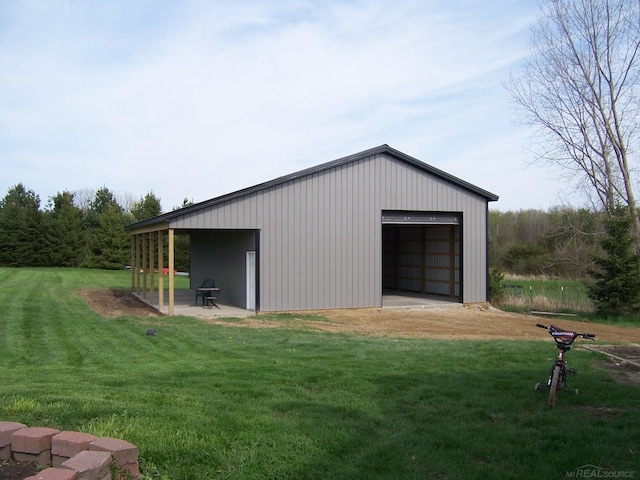 view of outbuilding with an outbuilding and driveway