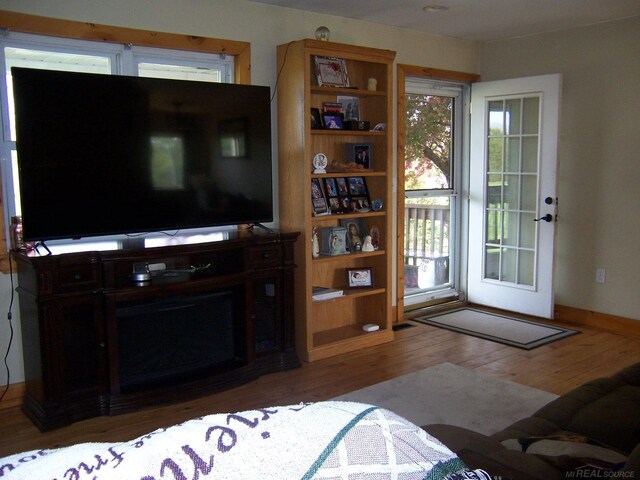 living area with wood finished floors
