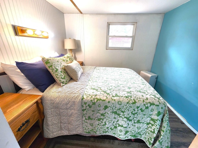 6494 Birch St, Gladwin, MI 48624 - bedroom with wood finished floors and baseboards