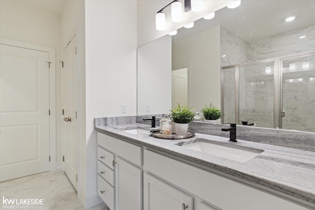 40699 Azalea Ln, Clinton Township, MI 48036 - bathroom featuring marble finish flooring, a marble finish shower, and double vanity