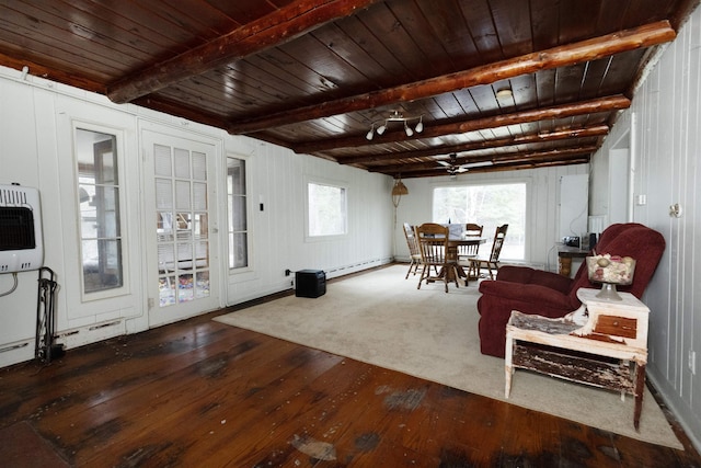 4440 W Cherry Creek Rd, Lewiston, MI 49756 - living area with heating unit, baseboard heating, hardwood / wood-style flooring, a wooden ceiling with exposed beams, and a ceiling fan