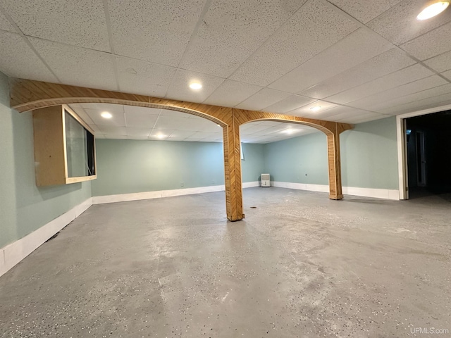 1400 W Hughitt St, Iron Mountain, MI 49801 - finished below grade area featuring recessed lighting, a drop ceiling, baseboards, and arched walkways