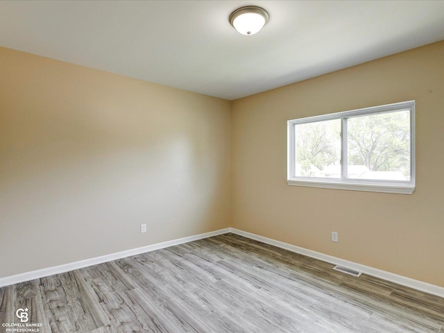 23740 Glenbrook St, Saint Clair Shores, MI 48082 - spare room with wood finished floors and baseboards