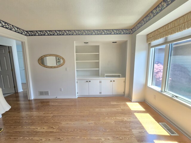 2707 Inverness Dr, Bay City, MI 48706 - unfurnished room with light wood-style flooring and baseboards
