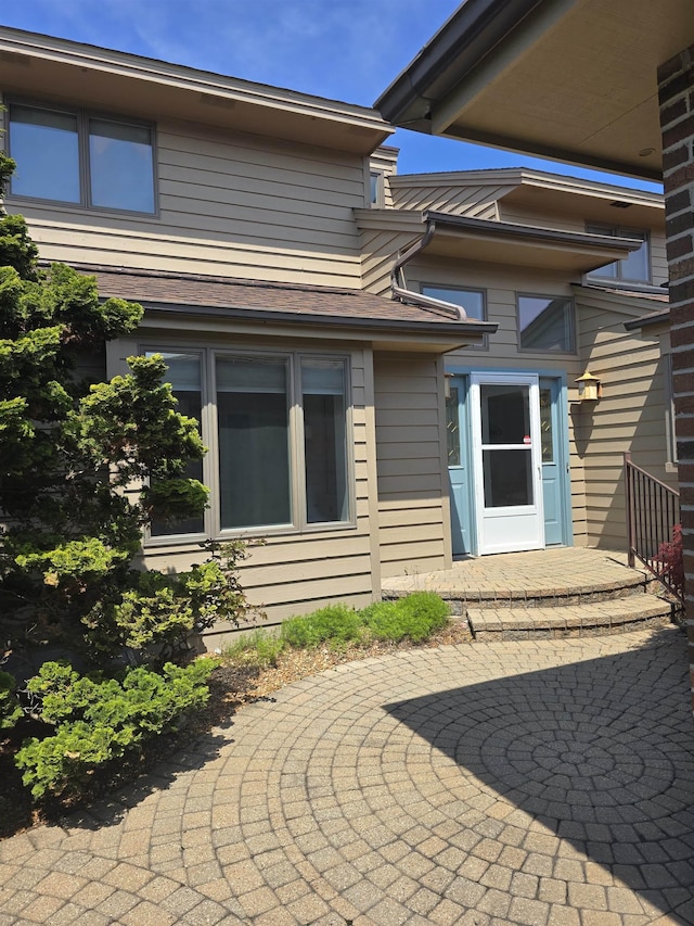 2707 Inverness Dr, Bay City, MI 48706 - rear view of house with a patio area
