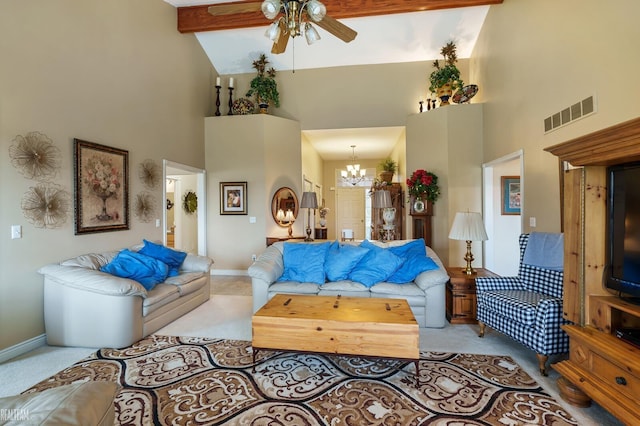 carpeted living room featuring high vaulted ceiling, a ceiling fan, a chandelier, and baseboards