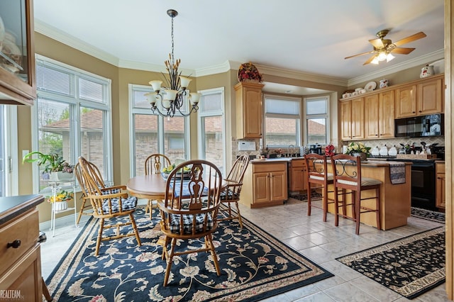 dining area with a chandelier, ornamental molding, a ceiling fan, and light tile patterned floors