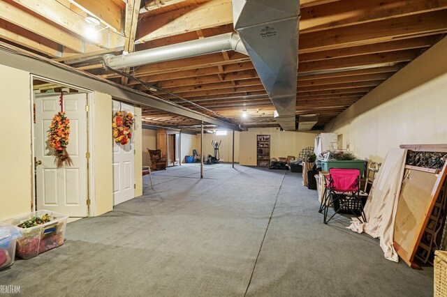 unfinished basement with carpet