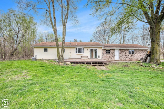 6424 Hunters Creek Rd, Imlay City, MI 48444 - back of house with a deck, a lawn, and cooling unit